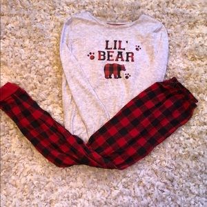 Pants and long sleeve shirt children pajamas.